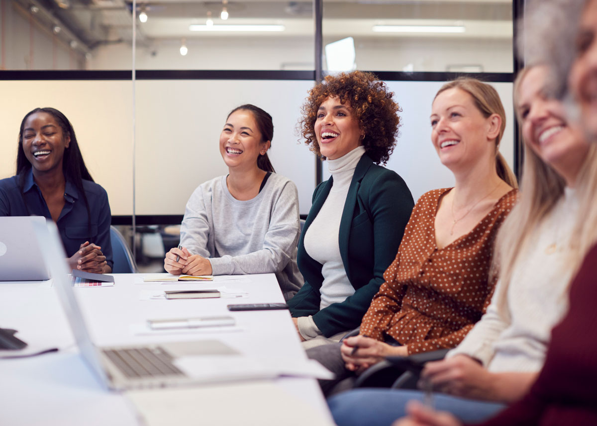 women engaged in an office meeting